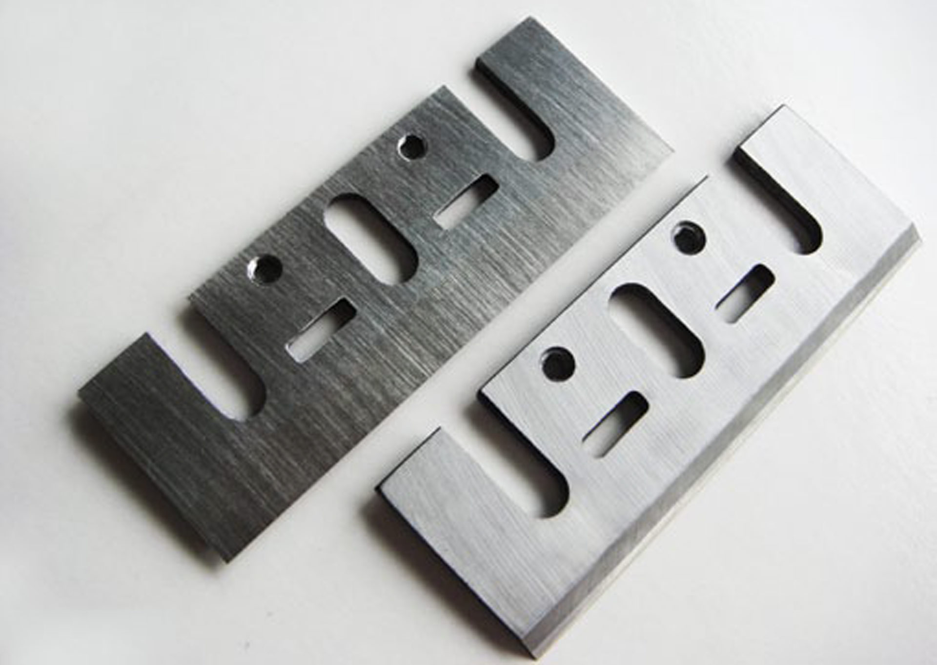 Carbide reversible planer blades